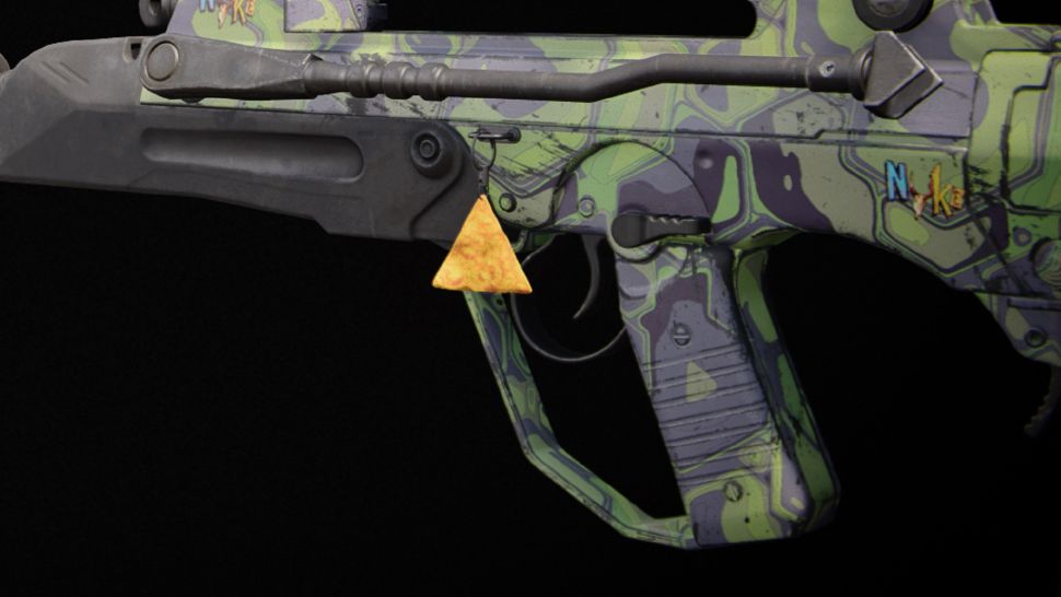 A dorito hanging from a modern assault rifle.