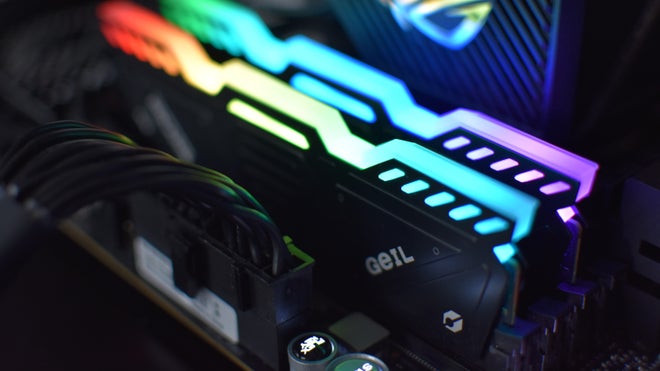 Two sticks of Geil RGB DDR5 RAM installed in a motherboard.