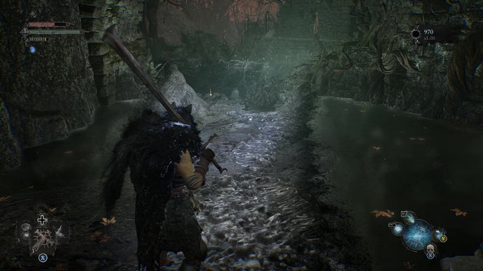 A screenshot from Lords Of The fallen that shows the player shining a lantern on a previously inaccessible stream, and revealing an Umbral area they're able to traverse.